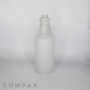 A plain, frosted white plastic bottle with a narrow neck and wide base stands on a white surface. The brand name "COMPAX" is displayed at the bottom left corner in grey letters. The background is minimal and white, emphasizing the bottle.
