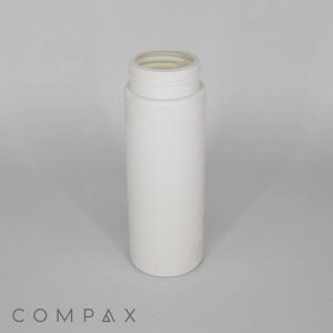 A plain white cylindrical plastic bottle with a screw-top opening, standing upright against a neutral background. The bottle is empty, and the cap is not shown. The brand name "COMPAX" is printed in gray at the bottom left corner of the image.