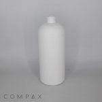 A plain, white, cylindrical plastic bottle with a screw top opening is centered against a neutral gray background. The bottle appears to be empty, and the word "COMPAX" is visible in the lower left corner.