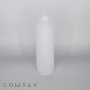 A plain white cylindrical bottle with a small cap on top, placed against a neutral gray background. The brand name "COMPAX" is printed in the lower-left corner.