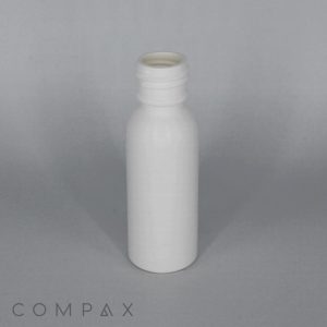 A small, white plastic bottle with a screw cap sits on a light gray surface. The bottle is plain with no label or markings. The word "COMPAX" is partially visible in gray text at the bottom left corner of the image.