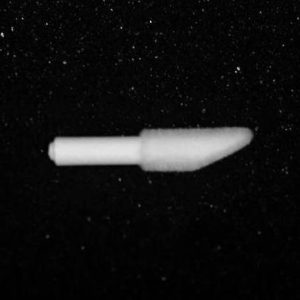 A Nylon Flocking Applicator floating in the dark outer space with stars scattered in the background. The applicator has a cylindrical body with a pointed tip and is shown in grayscale.