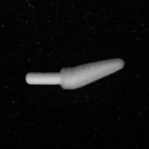 A Nylon Flocking Applicator with a fuzzy, elongated white tip and a cylindrical base, set against a black background. The soft texture of the applicator appears slightly frayed at the end and resembles a cotton swab or small brush.