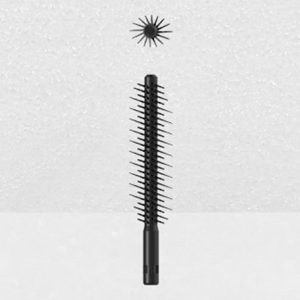 A black Plastic Brush Applicator with multiple bristles arranged in a spiral pattern around it is placed vertically against a light, textured background, while its circular bristle head floats above.