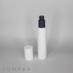 A PP Round Airless Bottle, featuring a sleek white cylindrical design with a black pump dispenser, is showcased. The bottle has a matching white cap placed nearby. The word "COMPAX" is subtly displayed in the bottom left corner of the image, set against a plain gray background.