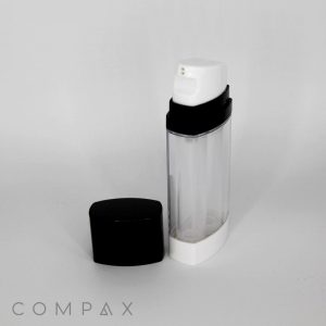 A rectangular, transparent 30mL Dual Chamber Airless Bottle with a black and white pump dispenser is displayed against a plain white background. The black cap has been removed and placed next to the bottle. The brand name "COMPAX" appears at the bottom left corner.
