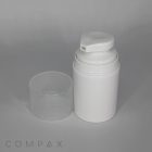 A white pump bottle with a clear plastic lid removed, showing the pump dispenser. The bottle stands against a plain, gray background. The word "COMPAX" is faintly visible at the bottom left corner of the image.