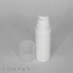 A white cylindrical pump bottle called the "All PP Round Airless Bottle with Pure Pump Spring" is positioned upright against a plain background. The clear removable cap is placed next to the bottle. The word "COMPAX" is written at the bottom-left corner of the image.