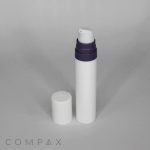 A white cylindrical Mini PP Airless Pump Bottle with a black Pure Pump Spring and a white cap placed beside it on a plain white background. "COMPAX" is printed in light grey letters at the bottom left corner of the image.