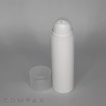 A white cylindrical PP Round Airless Pump Bottle with a transparent cap placed beside it. The brand name "COMPAX" is printed at the bottom of the image. The background is plain gray.