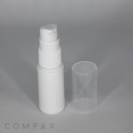 A small white PP Airless Pump Bottle with a transparent cap placed beside it. The bottle is designed for dispensing liquids like lotions or serums. The word "COMPAX" is printed in a modern font at the bottom left corner of the image.