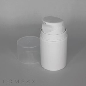 A PP Airless Pump Bottle with Overcap, featuring a white cylindrical design and push-down dispenser, is displayed against a gray background. The bottle's removable clear plastic cap is positioned beside it, and the word "COMPAX" can be seen at the bottom left corner of the image.