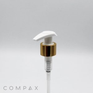 A close-up view of a white plastic Curved Pump with a gold-colored collar. The pump stem extends downward and is transparent, revealing the internal spring mechanism. The brand name "COMPAX" is visible in the bottom left corner of the image.
