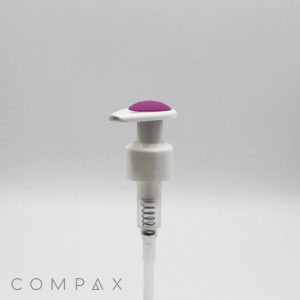 A pump with silicone top featuring a white base and transparent body, highlighted by a purple button on the top, is pictured against a plain, light background. The brand name "COMPAX" is displayed in the lower left corner.