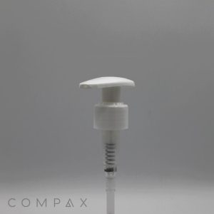 A close-up image of a white Curved Pump dispenser against a plain gray background. The pump has a broad, flat top and a spring mechanism visible below. The word "COMPAX" appears in light, lowercase letters near the bottom left corner of the image.