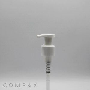 A white Teardrop Pump dispenser set against a plain grey background. The pump features a long nozzle and a spring mechanism visible inside the transparent lower portion. The word "COMPAX" is faintly visible in the bottom-left corner.
