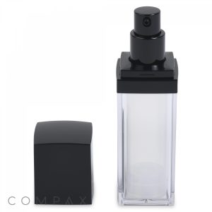 A square Double Wall Airless Bottle made of clear plastic with a black pump dispenser and a matching black cap placed next to it. The container appears to be for cosmetic or skincare products. The brand name "COMPAX" is visible at the bottom of the image.