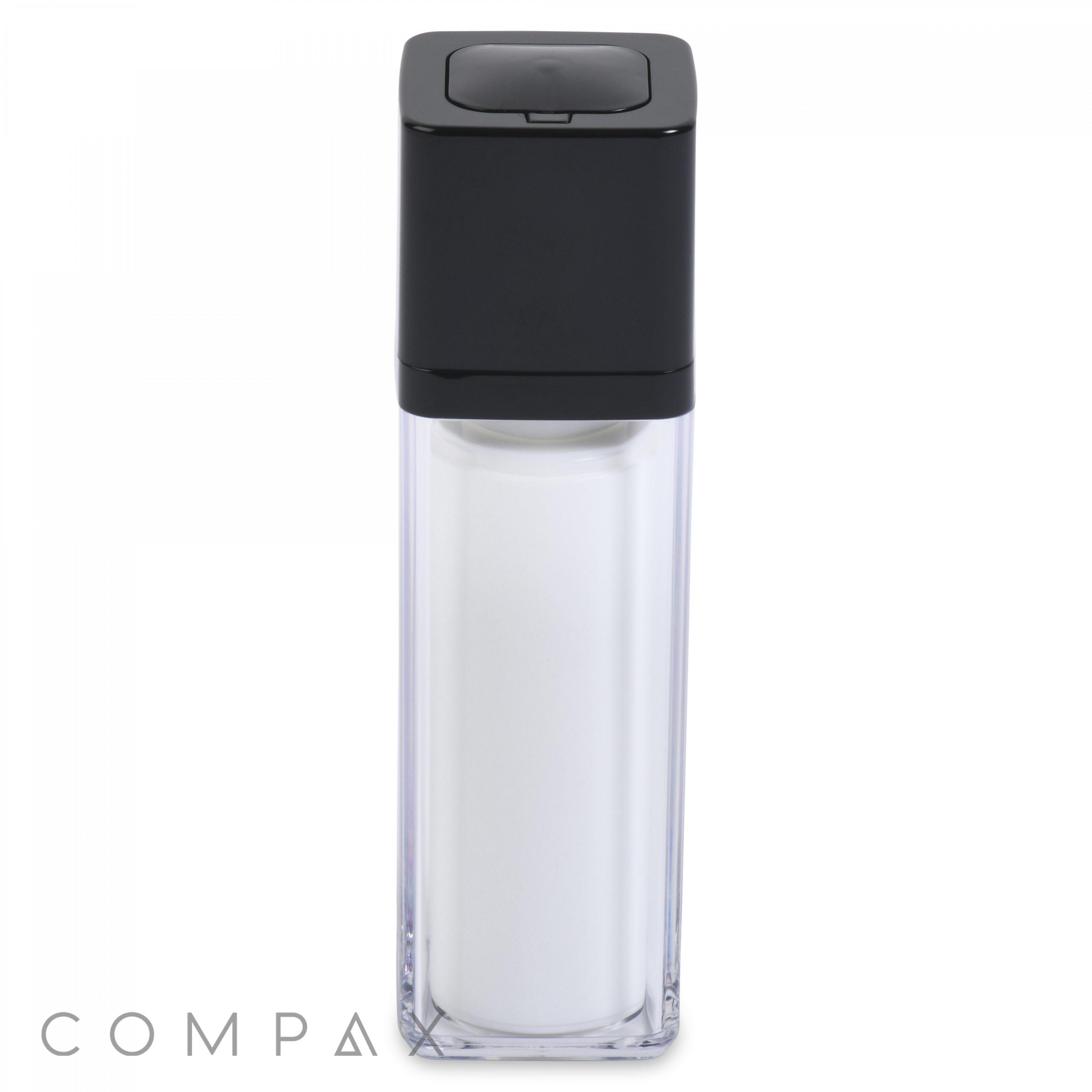 A Square Double Wall Airless Bottle with a clear rectangular body and a black square cap. The bottle's transparency reveals a white interior cylinder, and the brand name "COMPA" is faintly visible at the bottom left corner.