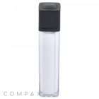 A sleek, transparent rectangular bottle with a black cap, filled with a white substance. The cap is designed to be pressed down, likely for dispensing the contents. "Compax" is written in light grey text at the bottom left corner of the image. This is the Square Double Wall Airless Bottle.