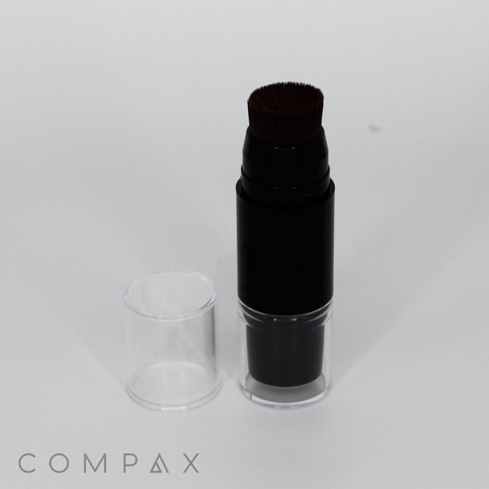 A tube of Dual Stick + Blender in black with a matching black cap.