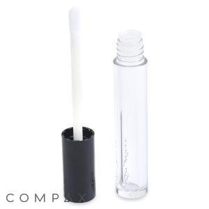 An open 5mL Lip Gloss Bottle with a black cap and a clear body. The applicator wand with a white sponge tip is attached to the cap, standing upright next to the bottle. The word "COMPAX" is visible at the bottom left of the image.