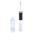 A clear Square Dual Lip + Eye Bottle stands open with its wand applicator leaned against it. The wand has a white sponge tip and a black cap. The background is solid white, and the word "COMPAX" is visible in the bottom left corner.