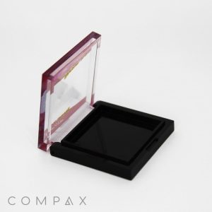 The Single Well Square Compact in black with a clear lid.