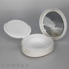 A Round Cushion Compact with Mirror, featuring an open white case with a mirror on the inner side of the top lid. The bottom section is designed with a circular space for holding a cosmetic product. The brand name "COMPAX" can be faintly seen in the lower left corner of the image.