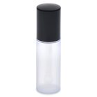 A mini round frosted plastic cosmetic bottle with a black cap, displayed against a white background. The word "COMPAX" is written in thin, gray letters at the bottom left corner of the image.