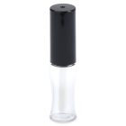 A clear and cylindrical Mini Lip Gloss Bottle with a black cap. The lower part of the bottle holds the lip gloss, while the upper part with the applicator is encased in the black cap. The word "COMPAX" is written at the bottom left of the image.