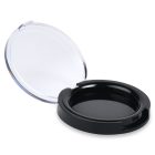 A Round Compact featuring a black, open design with a clear lid. Inside, the bottom of the case is divided into two deep and narrow sections, separated by a flat surface in the center. Positioned against a white background, the compact prominently displays the "COMPAX" brand name at the bottom left.