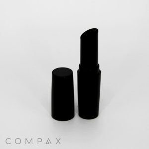 A Round Lipstick in black with a tube.