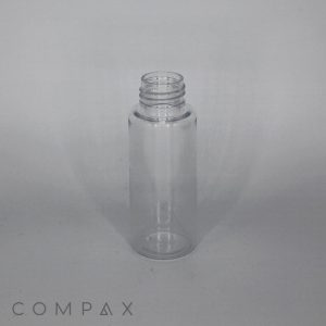 A 60mL Round PET Bottle stands upright against a plain gray background. This small, clear, cylindrical bottle has a screw-on cap and is empty and transparent, revealing no contents inside. The word "COMPAX" appears in the lower left corner of the image.