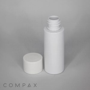 A 30mL Round PET Bottle with its circular cap removed placed beside it on a plain gray background. The bottle is cylindrical, and the word "COMPAX" is visible in the lower left corner.