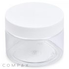 This is an image of a clear, empty 150mL PET Jar with a white screw-on lid. The jar is cylindrical and transparent, allowing the interior to be seen. The brand name "COMPAX" is visible in small text near the bottom left corner of the image.