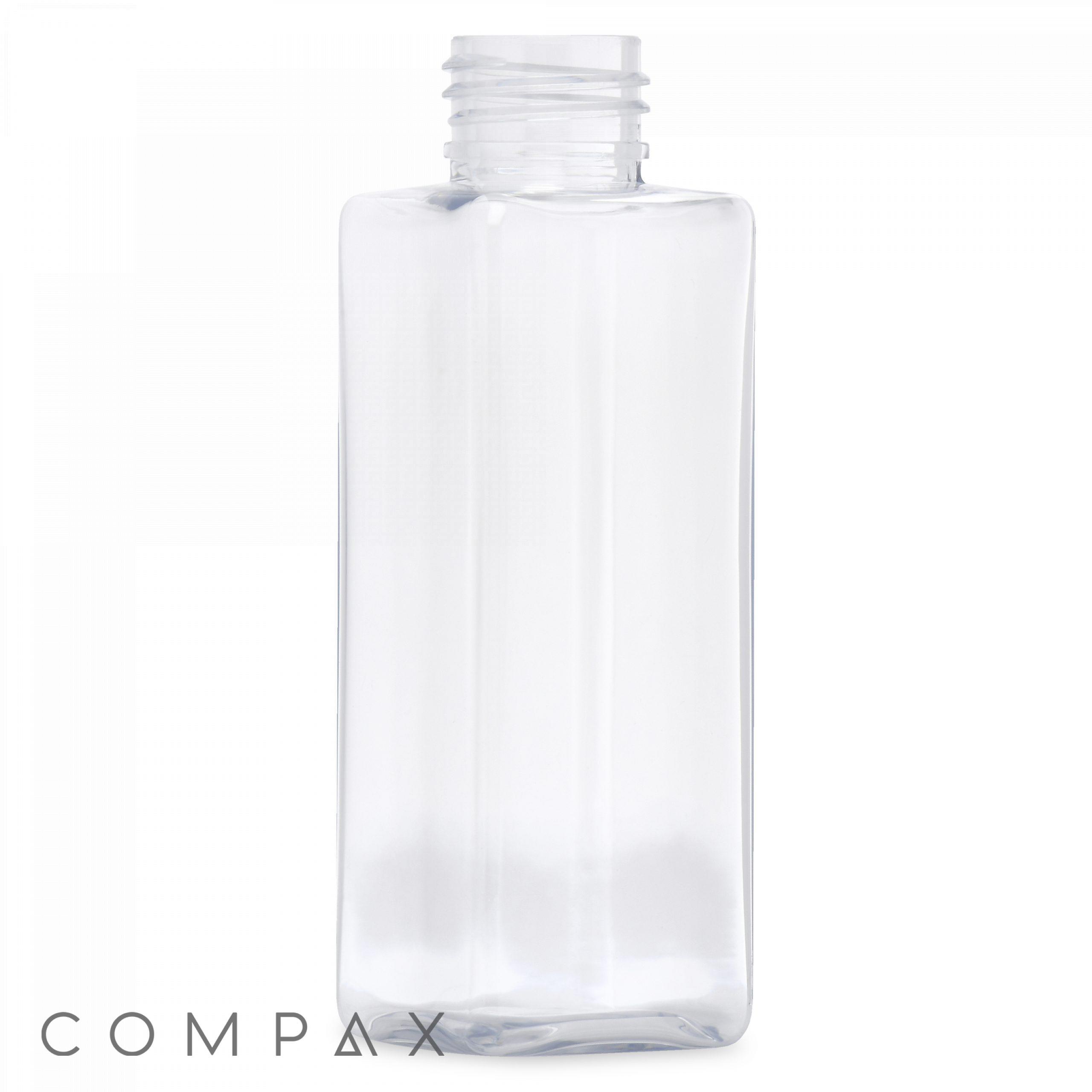A 100 mL PET Bottle, transparent and rectangular with a screw-on neck, perfect for holding liquids. The empty bottle stands upright and features the "COMPAX" brand name in the bottom left corner of the image.