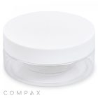 A cylindrical, transparent PET jar with a capacity of 200mL features a wide white lid. The jar allows clear visibility of its contents when filled. The brand name "COMPAX" is inscribed in small grey letters at the bottom left corner of the image.