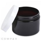 A black, cylindrical 350mL PET jar with a white lid, which is partially opened and resting on the side. The brand name "COMPAX" is displayed in the bottom left corner of the image. The container appears to be suitable for storing cosmetics or other small items.