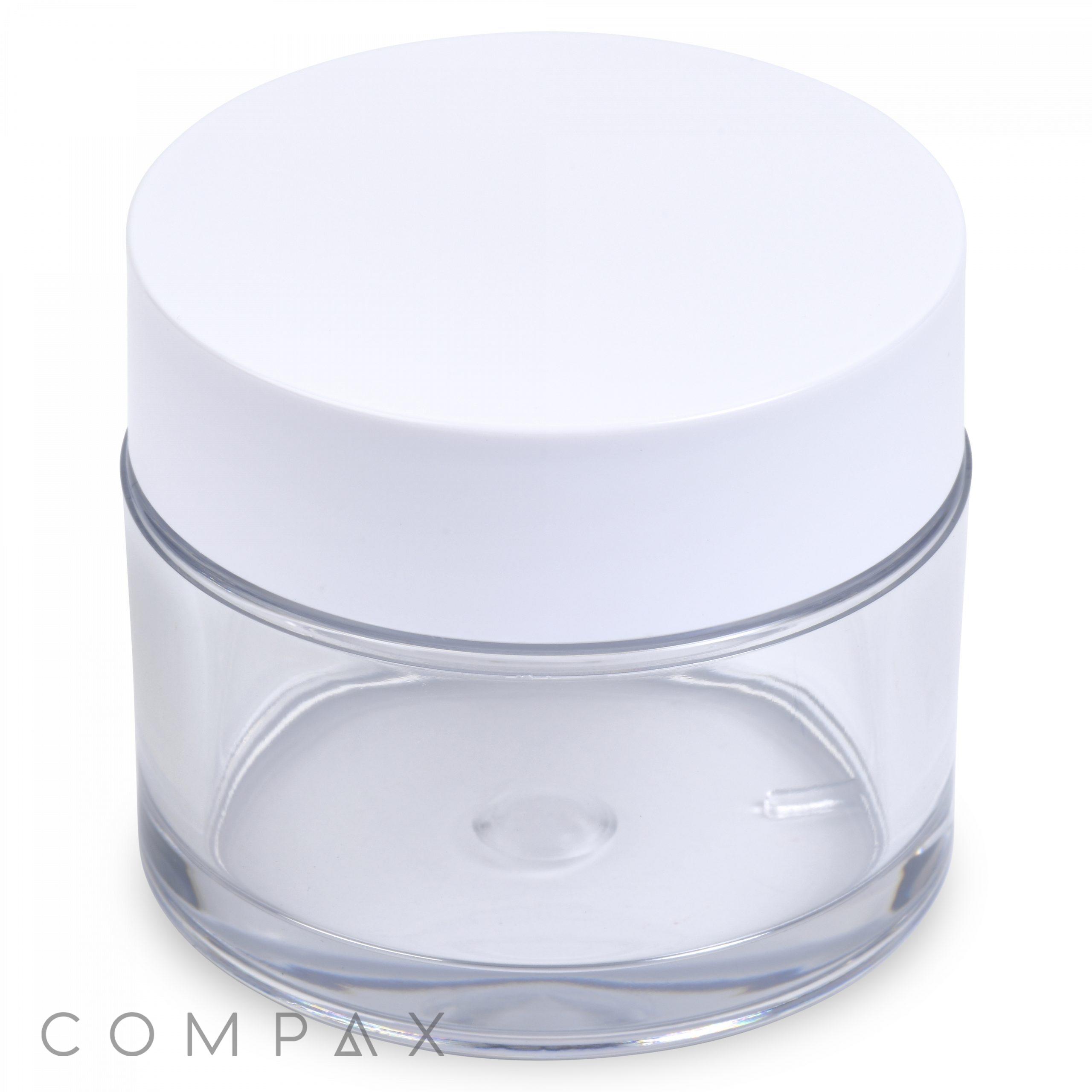 A 60mL PET Jar featuring a clear cylindrical design and a white screw-on lid. The jar is empty, boasting a smooth, minimalist aesthetic with the word "COMPAX" subtly printed near the bottom edge.