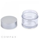 A 50mL PET jar with a silver lid removed, placed side by side on a white background. The transparent cylinder appears to be empty, and the "COMPAX" logo is visible in the bottom left corner.