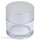 A 50mL PET Jar, featuring a clear, empty round body and a sleek silver lid, designed for storing cosmetics or skincare products. The word "COMPAX" is subtly printed in the bottom left corner against a white background.