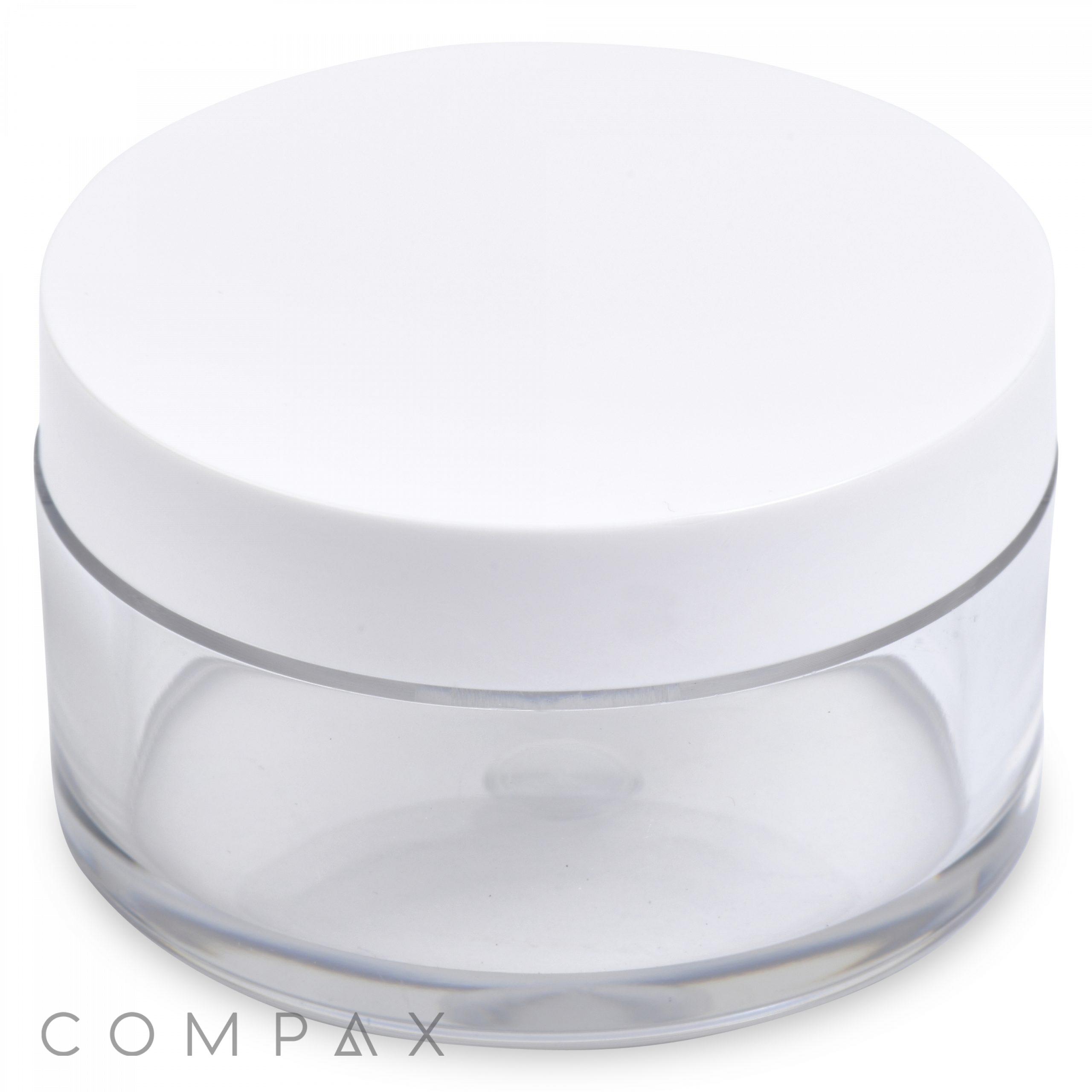 A small, transparent, round 30mL PET jar with a flat, white screw-on lid. The jar is empty and made of clear plastic, displaying the logo "COMPAX" at the bottom of the image.
