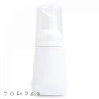 A 50 mL PET Foamer Bottle with a white plastic pump and clear cap. The bottle features a sleek and minimalist design, with the brand name "COMPAX" positioned in the bottom left corner of the image.