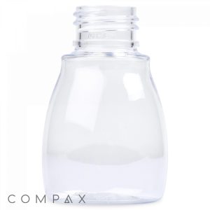 This 60 mL PET Bottle features a clear, empty plastic design with a screw-top neck, slightly flared at the base. The brand name "COMPAX" appears in grey text at the bottom left corner against a white background.