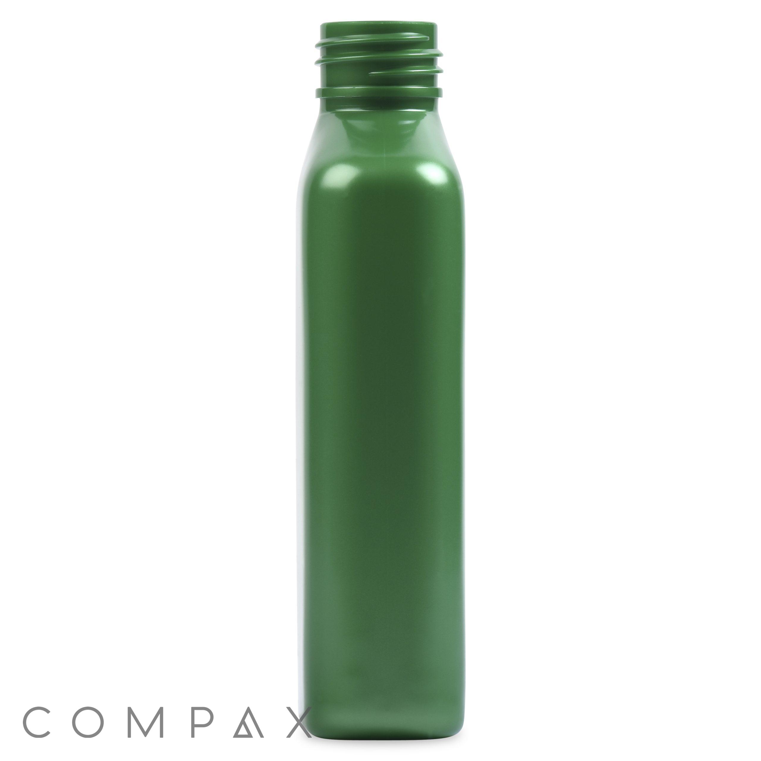 A tall, green Drug Oval Bottle made of plastic with a screw top opening and a smooth, cylindrical shape; the word "COMPAX" is visible in the bottom left corner of the image.