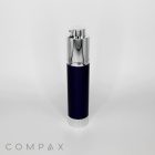 A sleek, black Round Helix Pump Airless Bottle with a silver pump and base stands upright against a white background. The brand name "COMPAX" is displayed in the bottom left corner in light gray font.