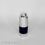 A sleek Round Helix Pump Airless Bottle with a silver top and a dark base is centered on a plain white background. The word "COMPAX" is printed in light gray at the bottom left corner of the image.