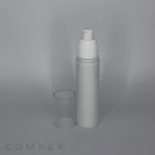 A white and gray Round Acrylic Airless Bottle with a removable clear cap stands against a plain gray background. The branding "COMPAX" is faintly visible at the bottom left corner of the image.