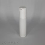 A tall, cylindrical Fluted Round Airless Bottle with a pump dispenser stands upright against a plain grey background. The bottle features a minimalist design and is stark white in color. The word "COMPAX" is faintly visible in the lower-left corner.