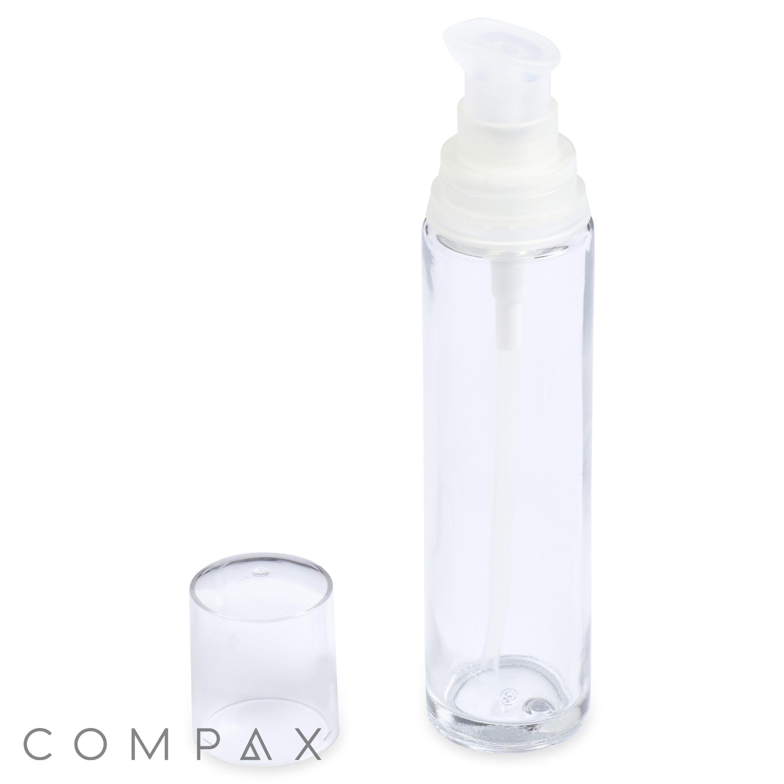 A transparent 48mL Glass Cylinder Round Bottle with a white pump and a removable clear plastic cap, placed next to the bottle. The background is white, and the word "COMPAX" is written in gray text at the bottom left corner.